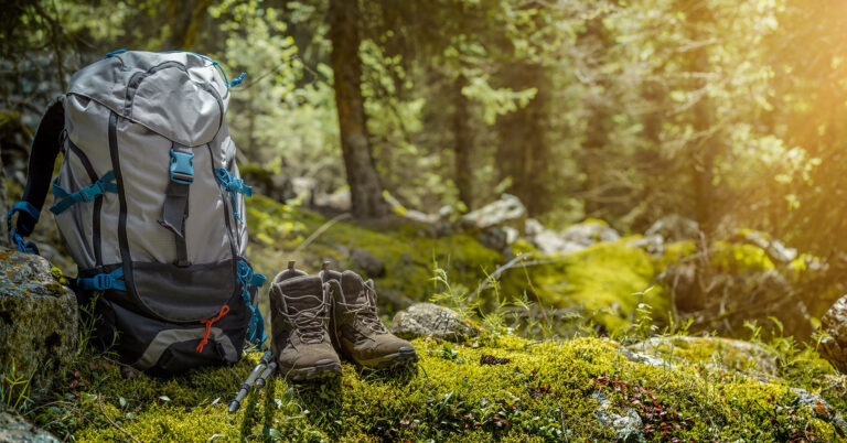 hiking gear in outdoor trail, woods